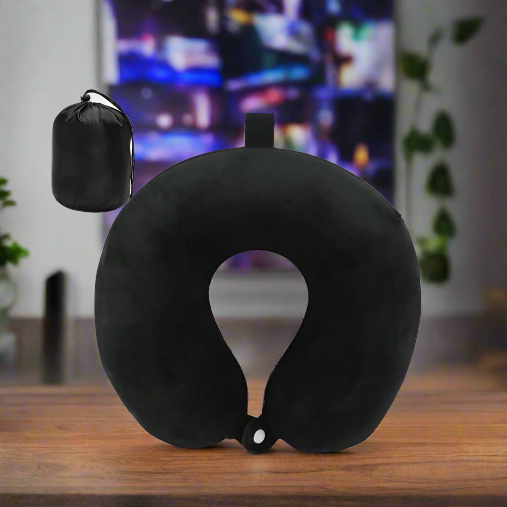 Black inflatable neck pillow with a carrying pouch on a white background